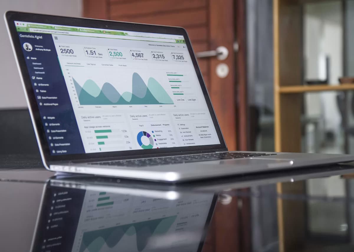 Laptop displaying business data for an education consultancy’s transition from Excel to CRM.
